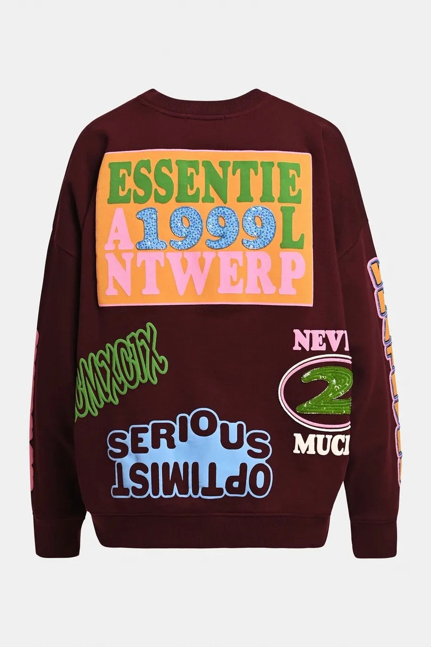 Sweatshirt en coton imprimé et brodé de paillettes et perles, imprimés multicolores sur fond bordeaux Essentiel Antwerp Campus -- Bonny Lyon