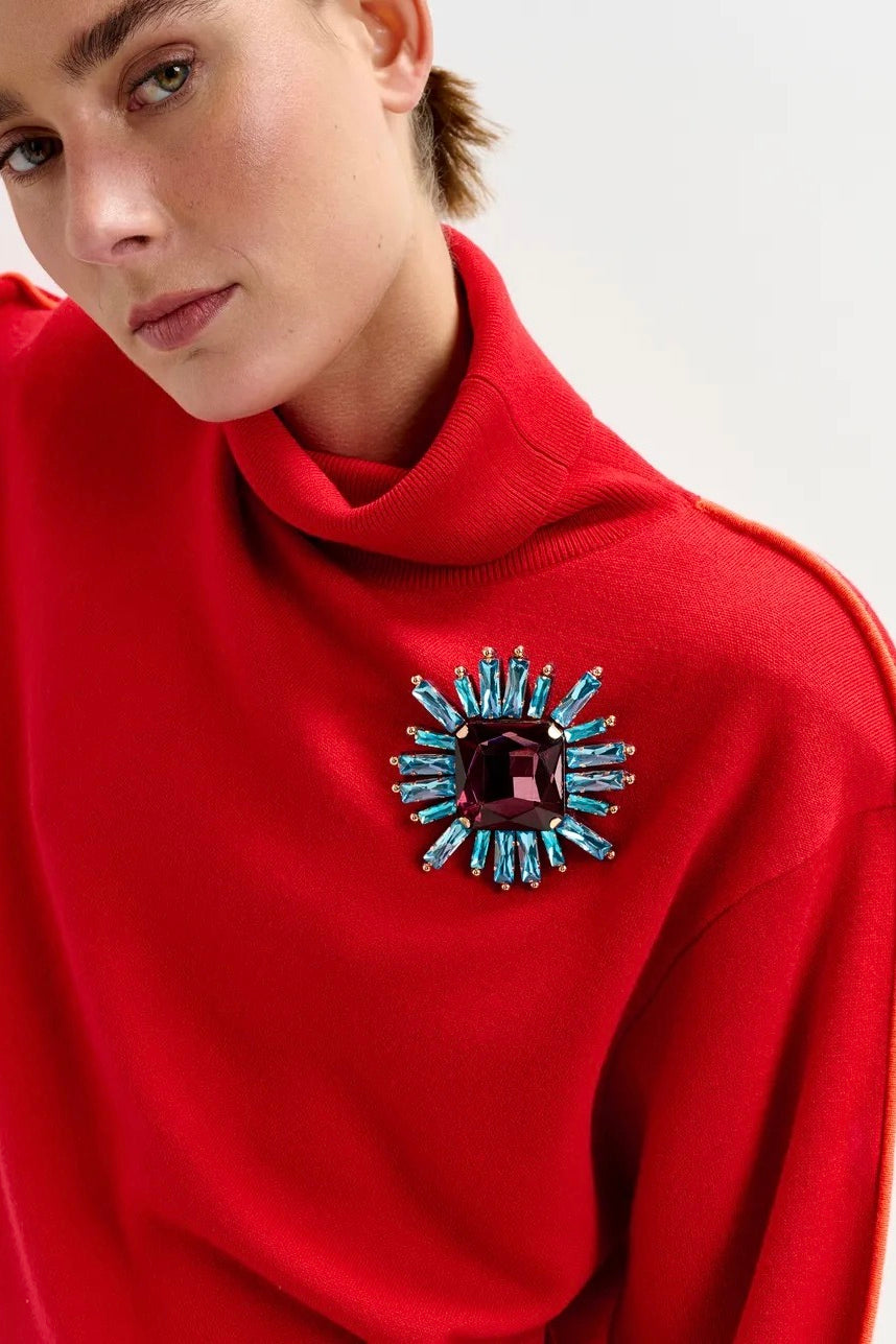 Broche Itime